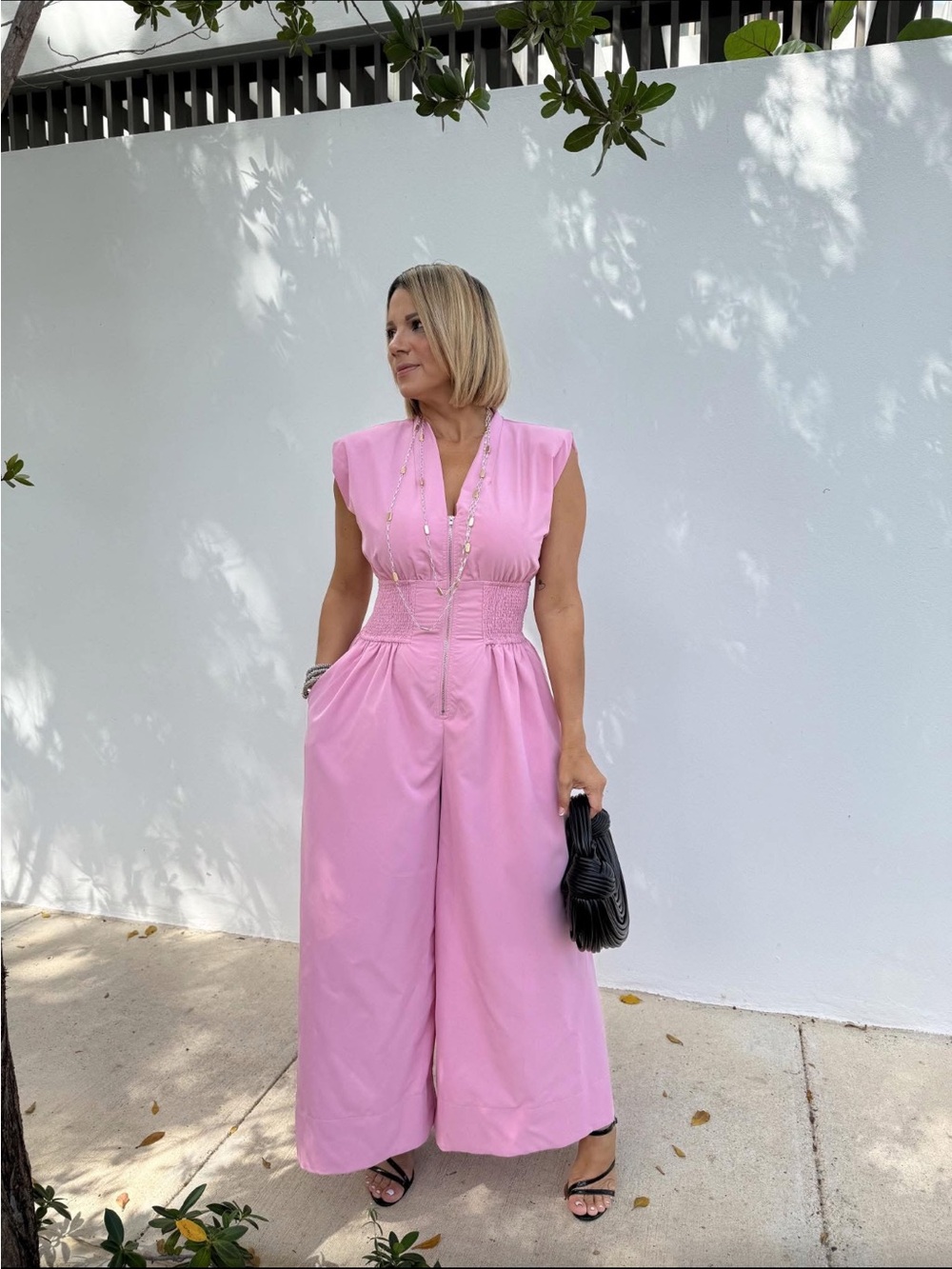 New Glam Sleeveless Pink Wide-Leg Jumpsuit Smocked Waist Zip Pockets One Piece